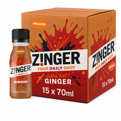 Zinger Organic Daily Shots 70ml Extra Hot Ginger Box with a single bottle and a vibrant packaging design.